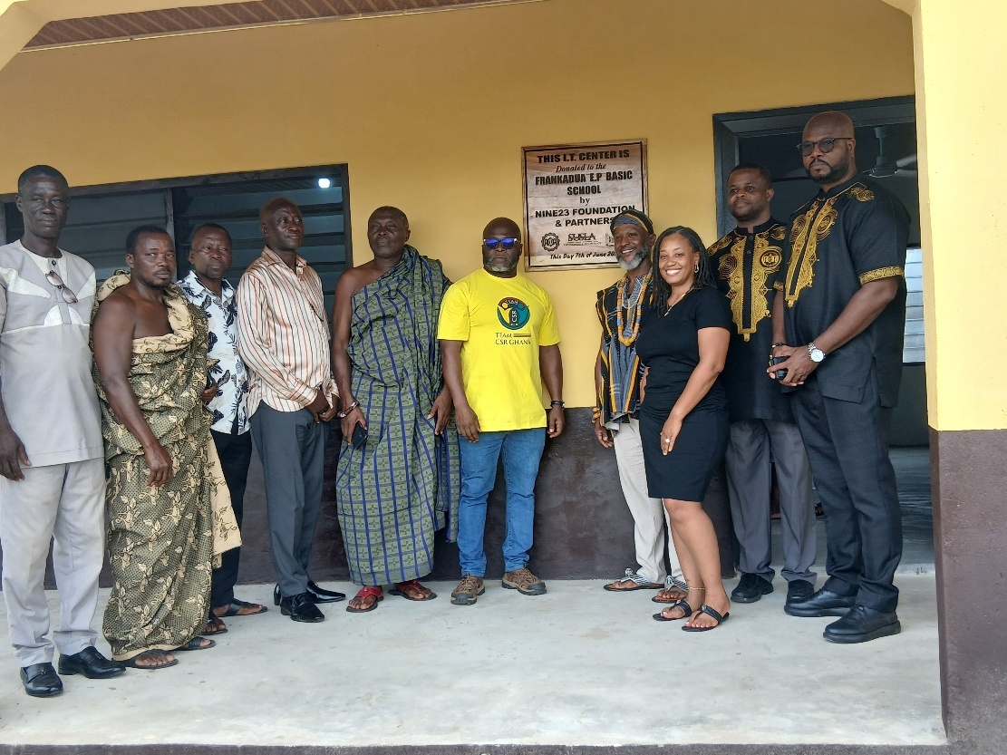 Partners at the IT laboratory plaque at Frankadua E.P. Primary School